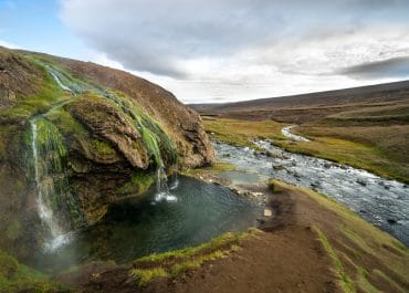 Hidden Highlands of East Iceland - Laugavallalaug hot spring waterfall