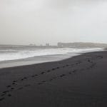 Reynisfjara black sand beach with views over to Dyrhólaey in South Iceland