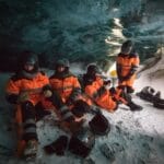 people inside Langjokull natural ice cave