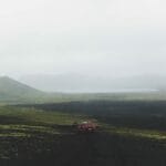 red super jeep driving in the highlands of Iceland on the way to Landmannalaugar