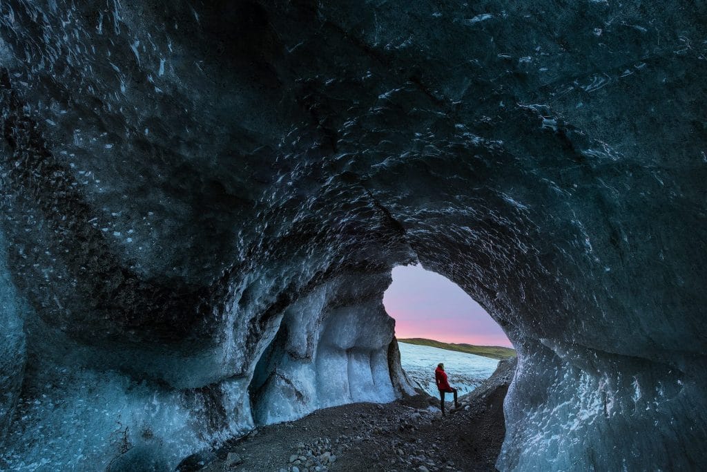 woman in an ice cave in Glacier Hiking in Skaftafell National Park