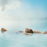 woman floating in the Blue Lagoon in Iceland