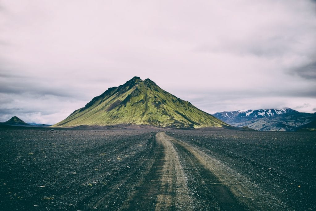 Self Driving road trip next to Mælifell volcano in the Highlands of Icelan
