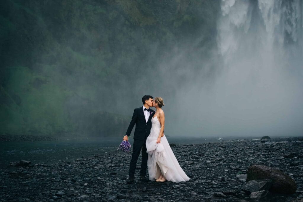 wedding photo shoot at Skogafoss waterfall in Iceland