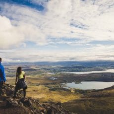 Honeymoon in Iceland, hiking on Esjan mountain with view over Reykjavik