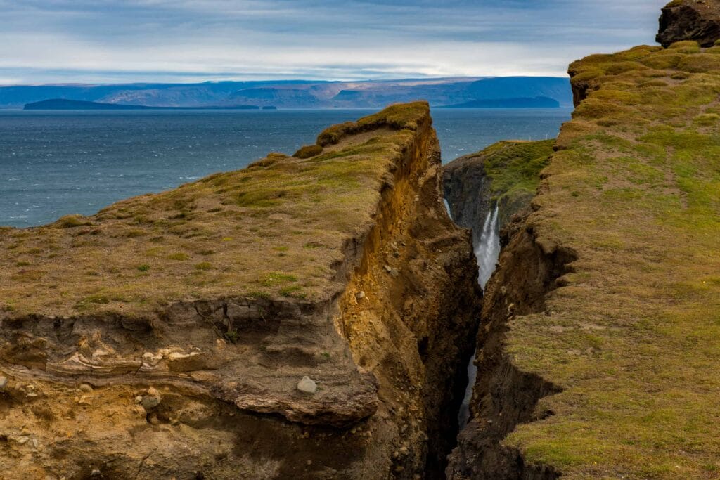 Ketubjörg cliffs and waterfall in north Iceland