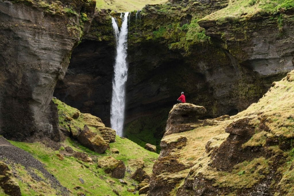 Kvernufoss walk behind waterfall in south Iceland