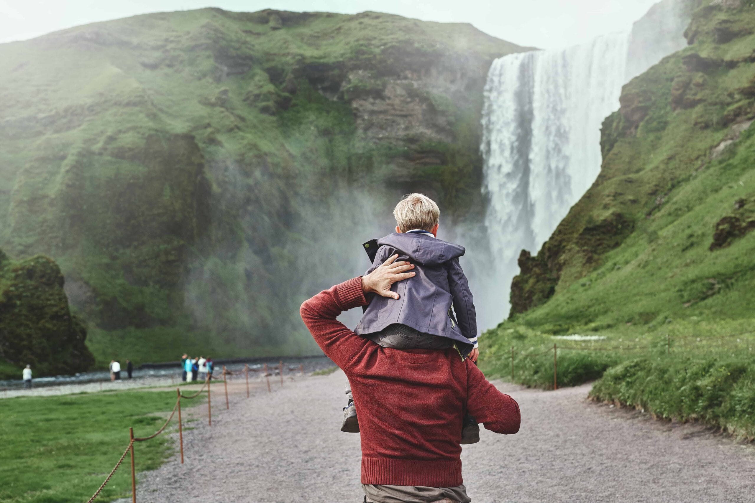 Iceland Family Travel at Skógafoss waterfall