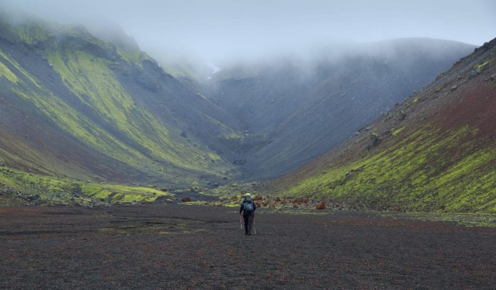 woman hiking in Eldgjá Crater in the highlands of Iceland