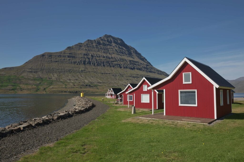 red houses in Eskifjörður village in the Eastfjords of Iceland