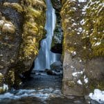 Iceland Tours Guide - Gljúfrabúi hidden waterfall in a gorge in south Iceland