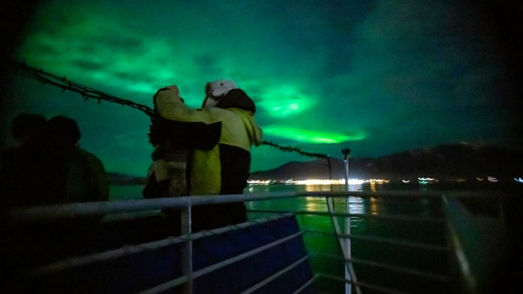 Northern Lights by boat, northern lights seen from sea in Reykjavik Iceland