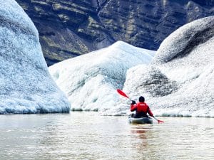Kayaking on glacier lagoon in Iceland