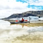 Kayaking on glacier lagoon in Iceland