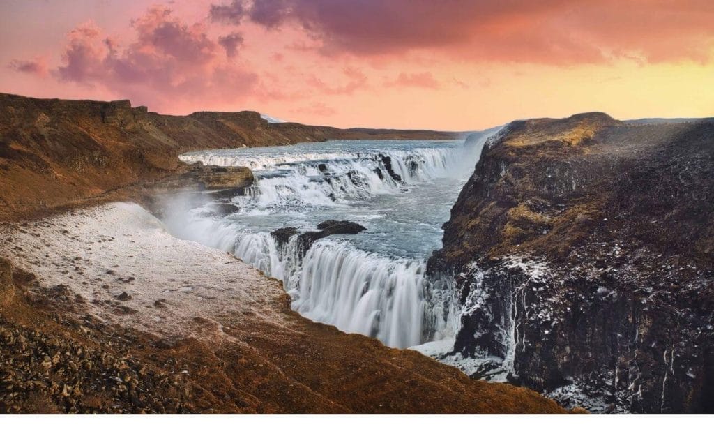 Iceland Must See - Sunset at Gullfoss waterfall in Golden Circle Iceland, midnight sun at Gullfoss