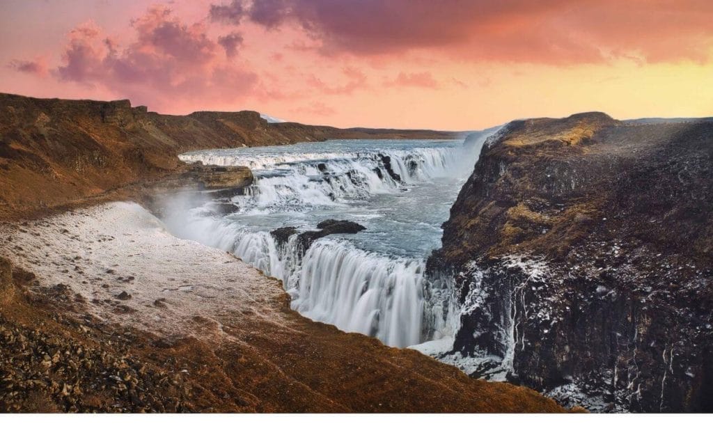 gullfoss waterfall visit Iceland Must See - Sunset at Gullfoss waterfall in Golden Circle Iceland, midnight sun at Gullfoss