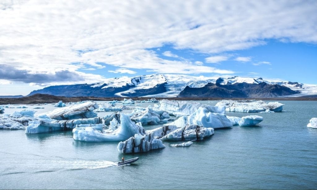 boat sailing on Jokulsarlon glacier lagoon in south east Iceland