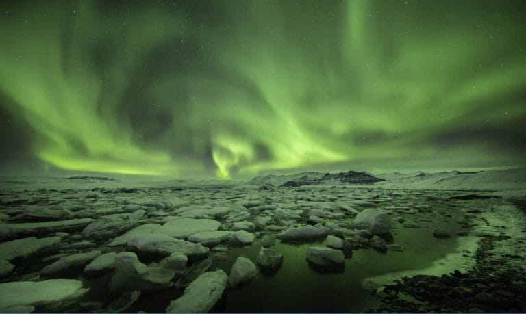 Reykjavik Northern Lights Tour, northern lights over Jokulsarlon glacier lagoon in south Iceland