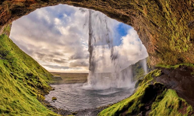South Iceland Packages - Seljalandsfoss walk behind waterfall