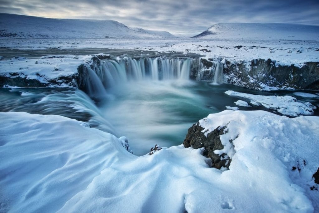 Goðafoss Waterfall in winter and snow - Affordable North Iceland Tour Packages