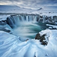 Goðafoss Waterfall in winter and snow - Affordable North Iceland Tour Packages
