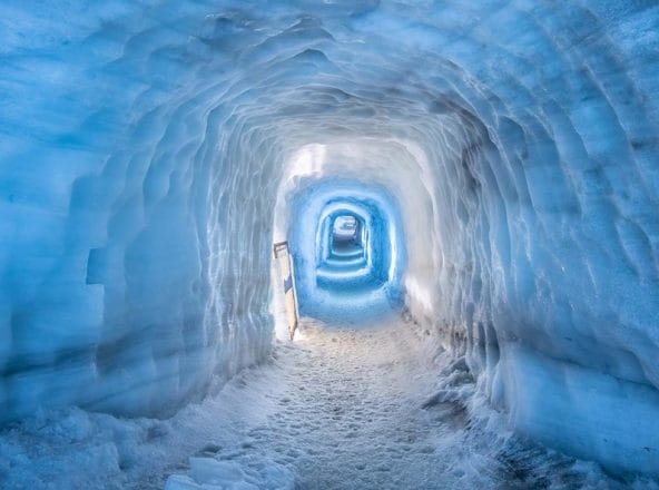 Into the Glacier Ice Cave Tunnel