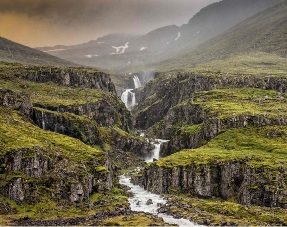 Klifbrekkufossar multi layer waterfalls in Mjoifjordur east Iceland