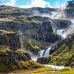 Klifbrekkufossar multi layer waterfalls in Mjoifjordur east Iceland