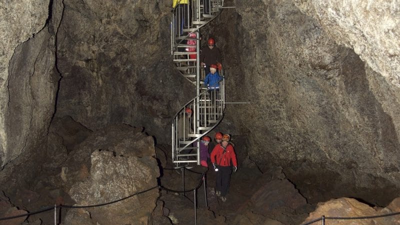people going down the stairs to Vatnshellir lava cave in Snæfellsnes Peninsula