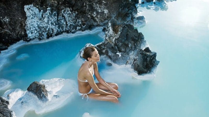 woman sitting in the Blue Lagoon in Iceland