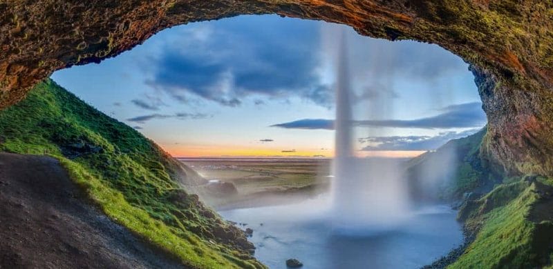 South Coast Iceland, Seljalandsfoss waterfall seen from behind