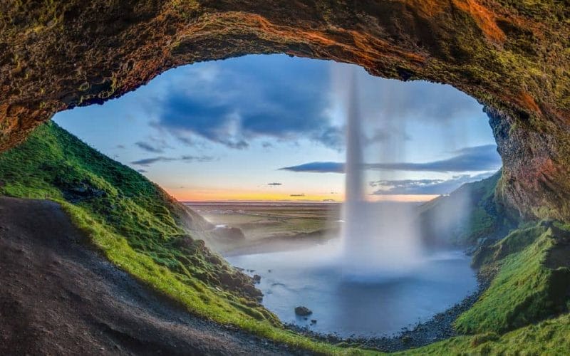 South Coast Iceland, Seljalandsfoss waterfall seen from behind