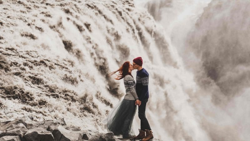 couple kissing in front of Dettifoss the most powerful waterfall in Europe, wedding photo shoot in Iceland