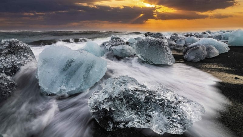 sunset at Diamond Beach in south Iceland