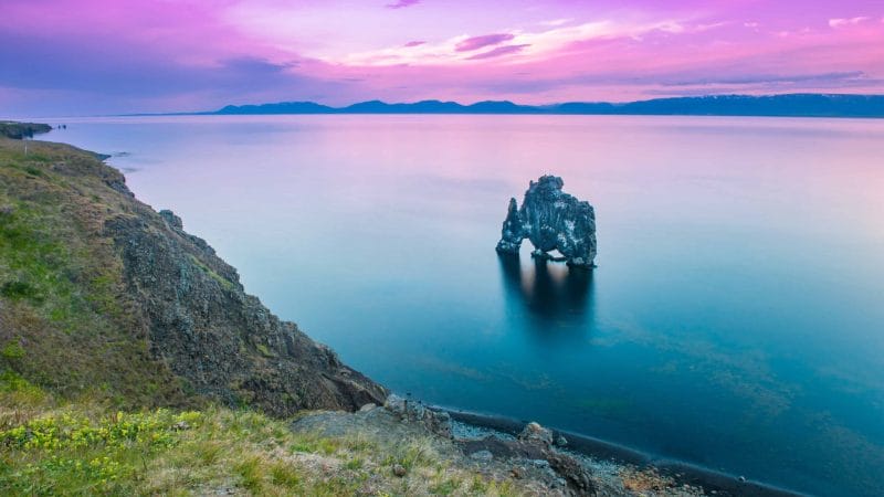 sunset at Hvitserkur cliffs in north Iceland, troll in the water in Iceland
