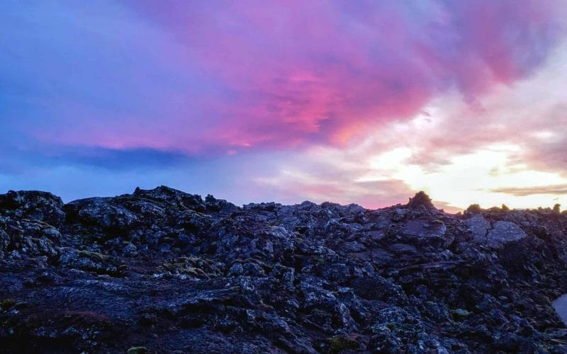 pink skies over lava fields in Grindavík Reykjanes