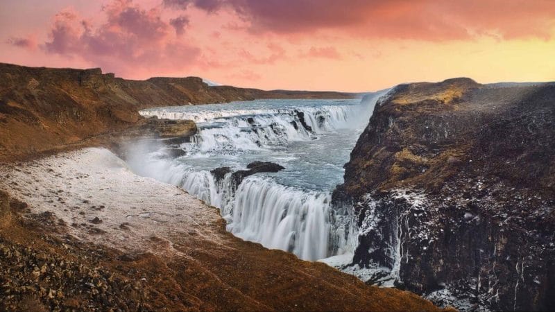 Iceland Must See - Sunset at Gullfoss waterfall in Golden Circle Iceland, midnight sun at Gullfoss