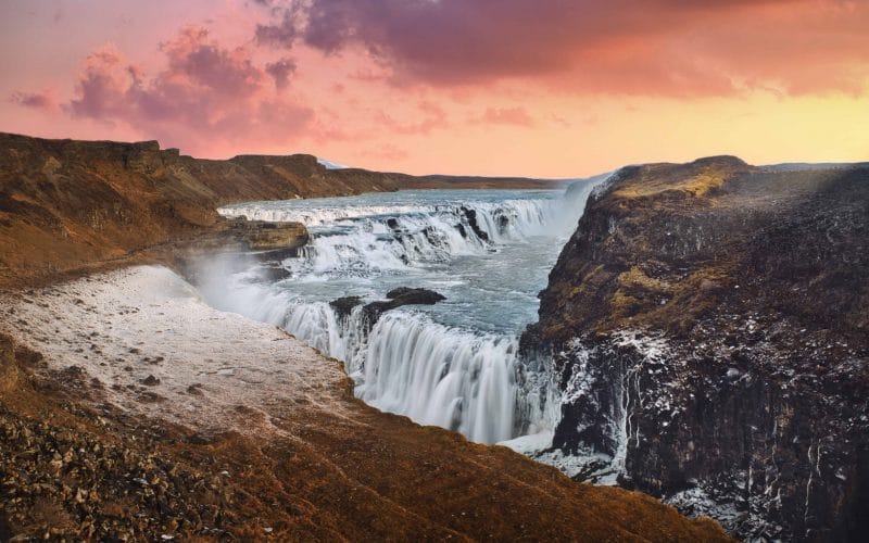 Iceland Must See - Sunset at Gullfoss waterfall in Golden Circle Iceland, midnight sun at Gullfoss
