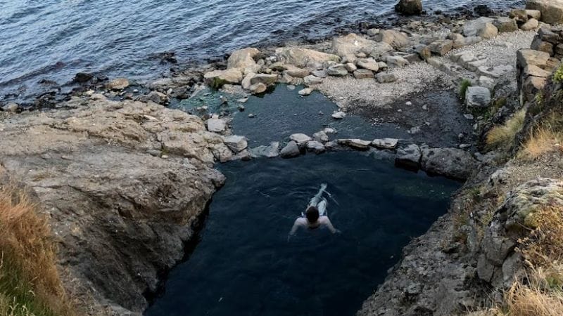 Hellulaug hot spring in the westfjords of Iceland