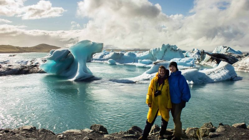 Honeymoon in Iceland, two people standing in front of Jokulsarlon glacier lagoon