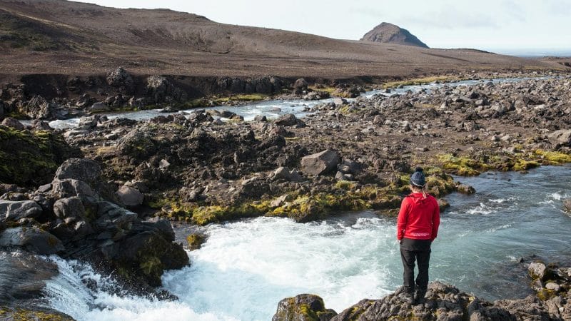 man standing in front of a river on Highland Super Jeep Excursion in south Iceland