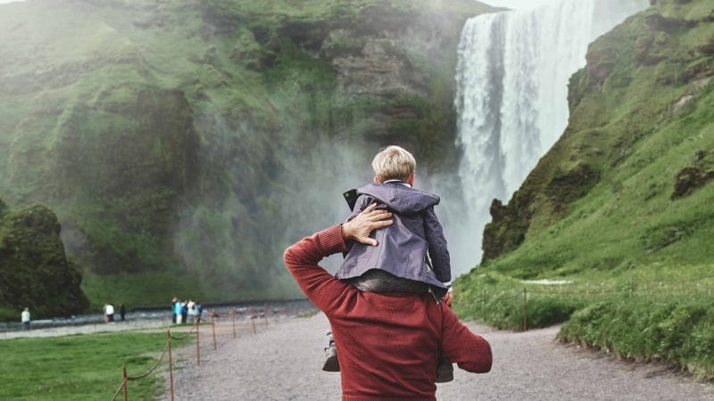 Iceland Family Travel at Skógafoss waterfall