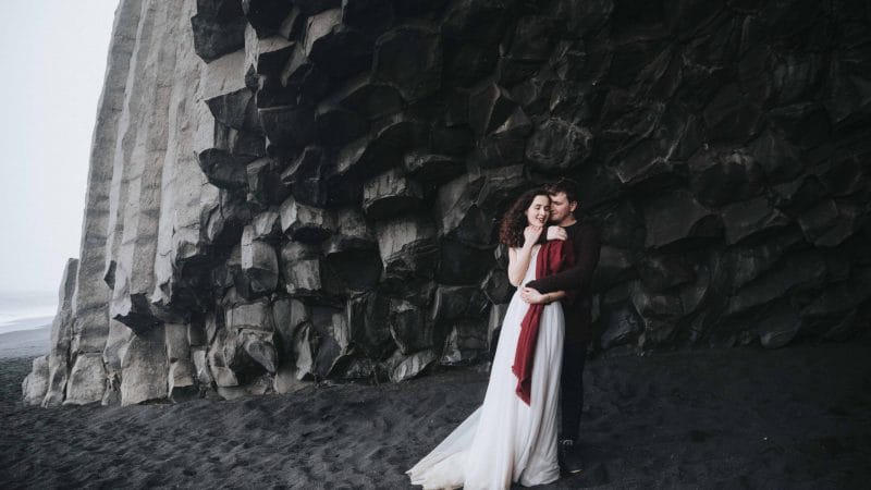 wedding photo shoot at Reynisfjara black sand beach in Iceland, Hálsanefshellir cave on Reynisfjara black sand beach