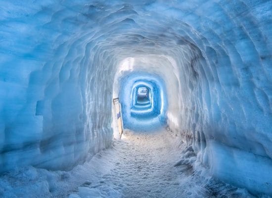 Into the Glacier Ice Cave Tunnel