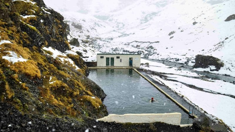 Seljavallalaug natural swimming pool in south Iceland in winter