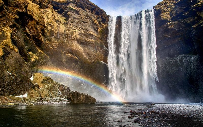 Amazing Rainbow at Skógafoss Waterfall - South Iceland Tours Booking