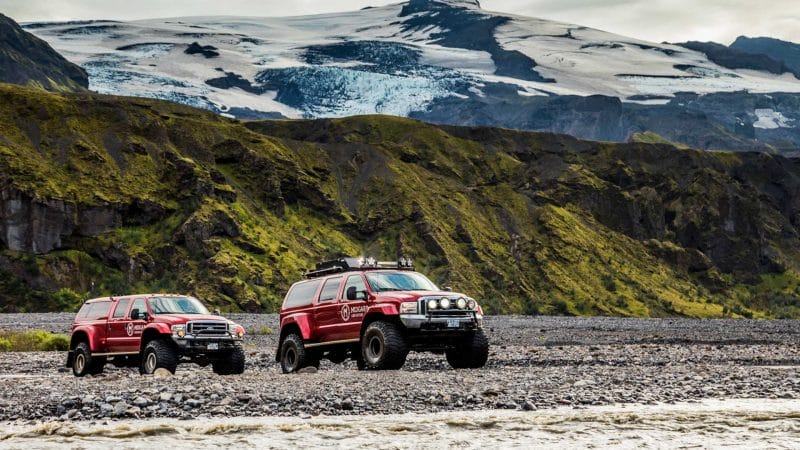 Super Jeep Tours Iceland, Super Jeep driving over a river on the way to Þórsmörk in the highlands of Iceland