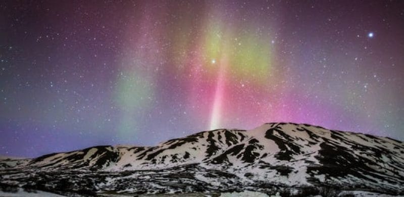 green and purple Northern lights in Iceland