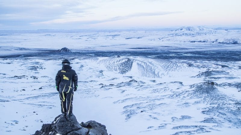 Iceland Snowmobile Tour, Snowmobile Iceland, Snowmobiling in Iceland, Man on Eyjafjallajokull snowmobile tour with views over the highlands of Iceland