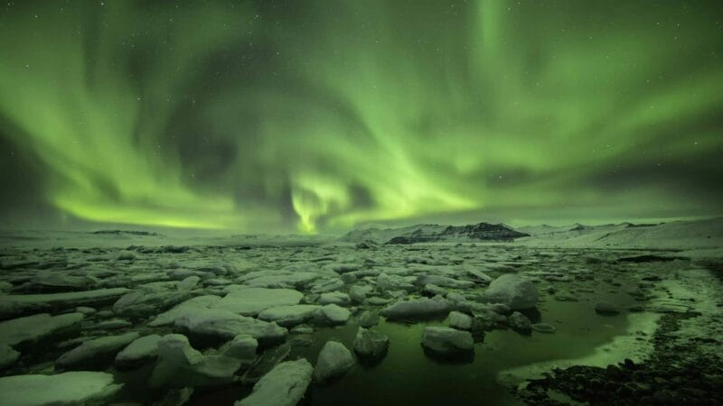 northern lights over Jokulsarlon glacier lagoon in south Iceland